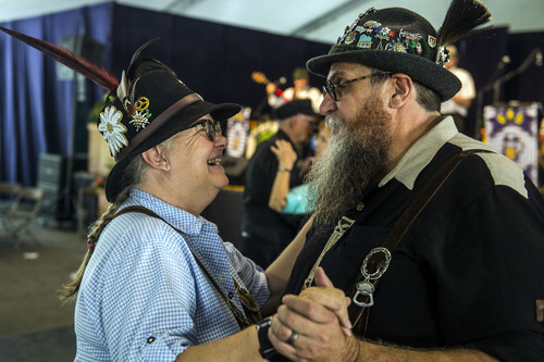 Chris Detrick  |  The Salt Lake Tribune
Mike and Cathy Niederhauser, of Draper, dance during Snowbird's 42nd Annual Oktoberfest Celebration Saturday August 16, 2014.