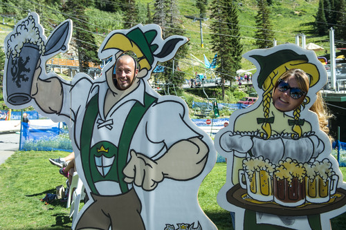 Chris Detrick  |  The Salt Lake Tribune
Robbie and Stacie Ward, of Kearns, pose for pictures during Snowbird's 42nd Annual Oktoberfest Celebration Saturday August 16, 2014.