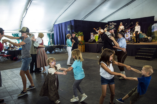 Chris Detrick  |  The Salt Lake Tribune
Patrons dance as B & B Allstars perform during Snowbird's 42nd Annual Oktoberfest Celebration Saturday August 16, 2014.