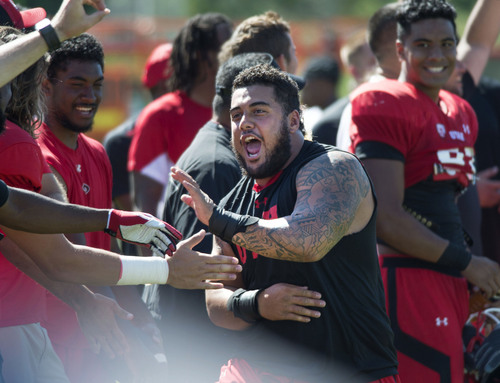 Steve Griffin  |  The Salt Lake Tribune


University of Utah defensive lineman Vilisenji Fauokuku celebrates with his teammates after throwing a football and hitting a garbage can set up downfield during the Kyle's Camp Olympics following football practice on the University of Utah baseball field in Salt Lake City, Monday, August 18, 2014. The camp Olympics consists of fun events players and coaches computer in following practice.