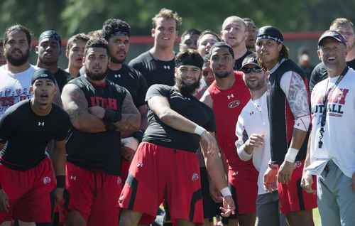 Steve Griffin  |  The Salt Lake Tribune


Coaches and players watch as University of Utah defensive back Brian Blechen tries to throw a football into garbage can set up downfield during the Kyle's Camp Olympics following football practice on the University of Utah baseball field in Salt Lake City, Monday, August 18, 2014. The camp Olympics consists of fun events players and coaches computer in following practice.