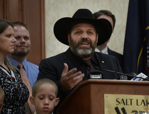 Scott Sommerdorf   |  The Salt Lake Tribune
Rick Koerber, his family and attorney Marcus Mumford, held a news conference the day after a federal judge tossed out 18 charges against Koerber that had alleged he operated a giant Ponzi scheme through his real estate company, Friday, August 15, 2014.