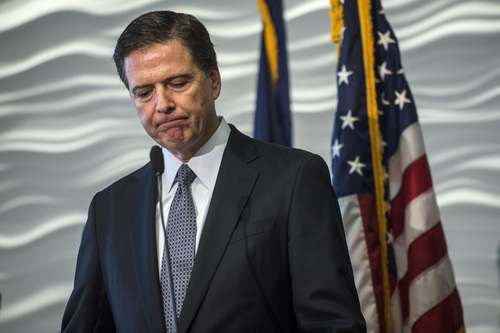 Chris Detrick  |  The Salt Lake Tribune
FBI Director James Comey speaks during a press conference at the FBI Field Office in Salt Lake City Tuesday August 19, 2014.