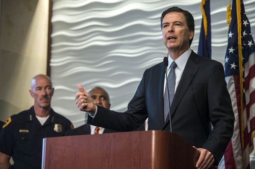 Chris Detrick  |  The Salt Lake Tribune
FBI Director James Comey speaks during a press conference at the FBI Field Office in Salt Lake City Tuesday August 19, 2014.