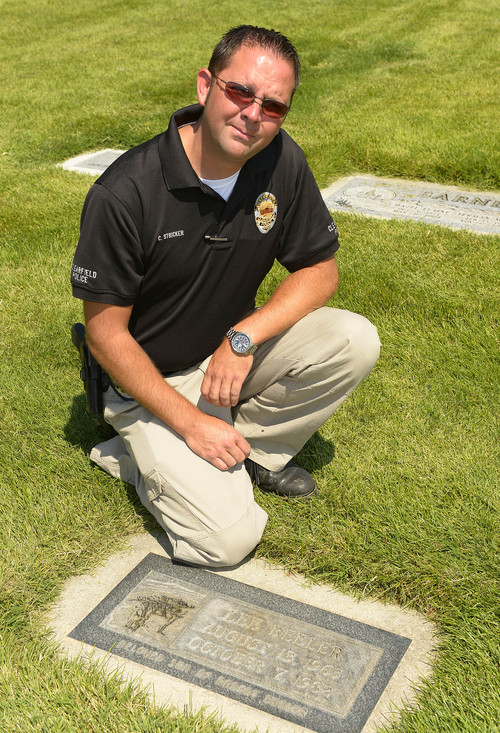 Leah Hogsten  |  The Salt Lake Tribune
Clearfield Police Department detective Carey Stricker wants Clyde Lee Jourdan's mother Mary Hagadus to have closure. Stricker, shown at the grave of Jourdan, August 8, 2014, died in Utah in 1982 and was buried in Clearfield Cemetery under the name Lee Beeler. Jourdan was a 17-year-old Michigan runaway and had been picked up hitchhiking by Robert Beeler, who allegedly murdered Lee in 1982.