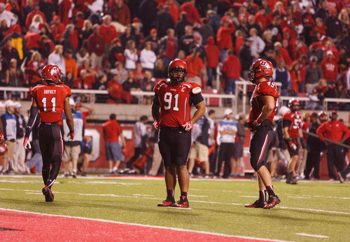 Trent Nelson  |  The Salt Lake Tribune
Utah Utes defensive back Davion Orphey (11), defensive tackle Tenny Palepoi (91) and defensive end Hunter Dimick (49) stand in the end zone immediately after Oregon State scored the game-winning touchdown as the University of Utah hosts Oregon State, college football at Rice Eccles Stadium Saturday, September 14, 2013 in Salt Lake City.
