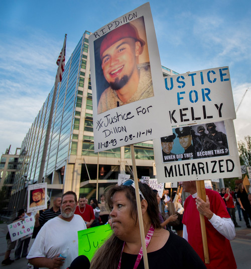 Trent Nelson  |  The Salt Lake Tribune
Gina Thayne, aunt of Dillon Taylor, speaks at a protest of police shootings, "Hands Up Don't Shoot," calling for justice for Dillon Taylor and Mike Brown, outside of the Federal Building in Salt Lake City, Wednesday August 20, 2014.