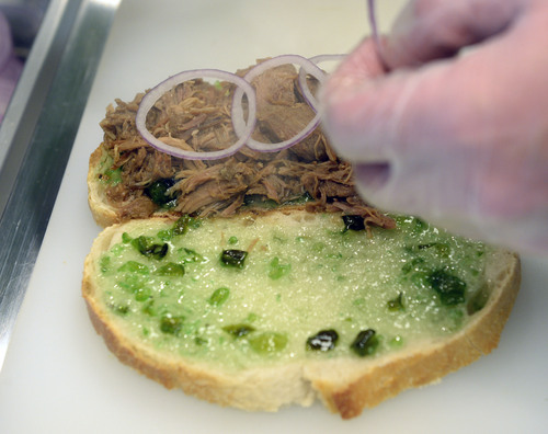 Al Hartmann  |  The Salt Lake Tribune 
Even Stevens is a sandwich shop with a heart. For every sandwich customers purchase, the restaurant gives away a sandwich to a local non-profit. Pictured here, Pot Roast Dip with turkey pot roast, Swiss cheese, red onion and jalapeno jelly on sourdough with au ju.