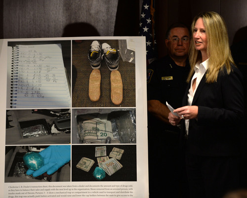 Steve Griffin  |  The Salt Lake Tribune

DEA Assistant Special Agent in Charge Nicki Hollmann  stands with leaders of The Metro Narcotics Task Force and its partners as they announce the seizure of 31 pounds of heroin during a press conference at the U.S. Drug Enforcement Administration's Salt Lake City District Office in Salt Lake City, Thursday, August 21, 2014.