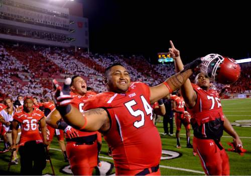 Trent Nelson  |  The Salt Lake Tribune
Utah Utes offensive linesman Siaosi Aiono (60) walks off the field at halftime as the University of Utah hosts Oregon State, college football at Rice Eccles Stadium Saturday, September 14, 2013 in Salt Lake City.