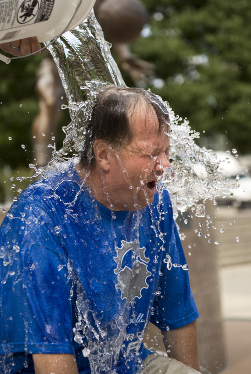 Lennie Mahler  |  The Salt Lake Tribune
Jazz CRO Don Stirling completes the "ALS Ice Bucket Challenge" to raise awareness and funds to treat the disease. Karl Malone issued the challenge to all Jazz fans Wednesday night on social media.