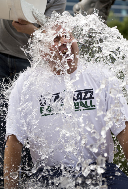 Lennie Mahler  |  The Salt Lake Tribune
Jazz COO Jim Olson completes the "ALS Ice Bucket Challenge" to raise awareness and funds to treat the disease. Karl Malone issued the challenge to all Jazz fans Wednesday night on social media.