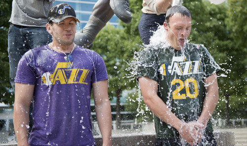 Lennie Mahler  |  The Salt Lake Tribune
Jazz fans Sean Lamb and Taylor Foulger complete the "ALS Ice Bucket Challenge" to raise awareness and funds to treat the disease. Karl Malone challenged all Jazz fans Wednesday night on social media.