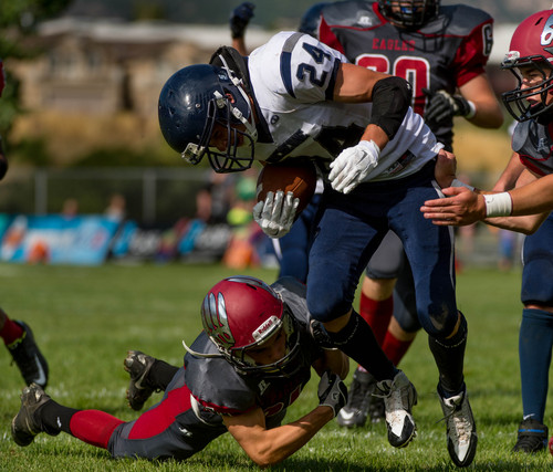 Trent Nelson  |  The Salt Lake Tribune
Duchesne's Dylan Despain runs for a touchdown against Layton Christian, high school football in Layton Thursday August 21, 2014.