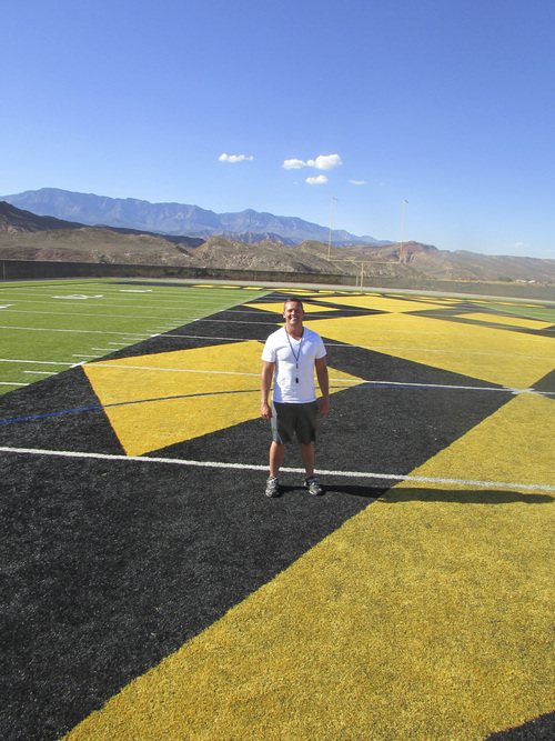 Tom Wharton  |  The Salt Lake Tribune 

Diamond Ranch football coach Rob Dias stands on the beautiful field at the southern Utah campus of 1A school.