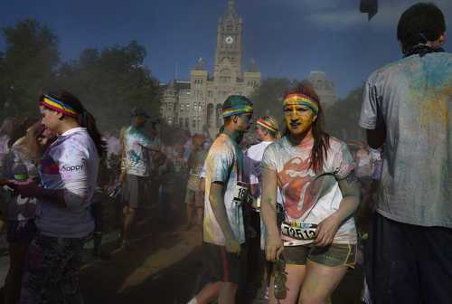 Scott Sommerdorf   |  The Salt Lake Tribune
After the Color Run was over, runners danced and threw colors in Library Square, Saturday, August 23, 2014.