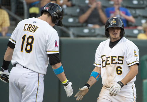 Rick Egan  |  The Salt Lake Tribune

Salt Lake Bees first baseman, C. J. Cron greets center fielder Tony Campana (6) after he scored on an over throw to first,  in PCL action, The Salt Lake Bee's vs The El Paso Chihuahuas, Monday, August 11, 2014