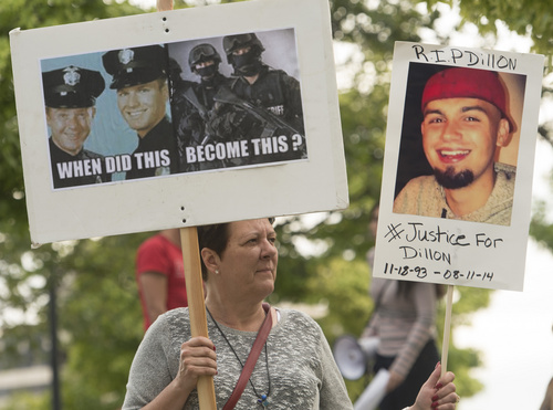 Rick Egan  |  The Salt Lake Tribune

Protesters march in downtown Salt Lake City, in solidarity with Mike Brown, Dillon Taylor, Danielle Willard and others who they feel were killed unjustly by police. Monday, August 25, 2014.