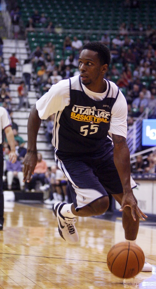 Kim Raff | The Salt Lake Tribune
Kevin Murphy dribbles down court during the Jazz Scrimmage at EnergySolutions Arena in Salt Lake City, Utah on October 6, 2012.
