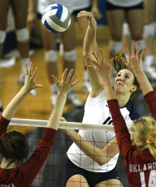 Rick Egan  | The Salt Lake Tribune 

Jennifer Hamson (19) spikes the ball as BYU faced Oklahoma in women's NCAA volleyball action at the Smith Fieldhouse in Provo, Saturday, December 1, 2012.