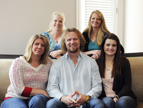 Jerry Henkel  |  The Associated Press
Kody Brown sits with his wives in July at one of their homes in Las Vegas. They are the polygamist family featured on TLC's "Sister Wives" program.  Pictured are: top row, Janelle, left, and Christine; bottom row, Meri, left, Kody and Robyn.