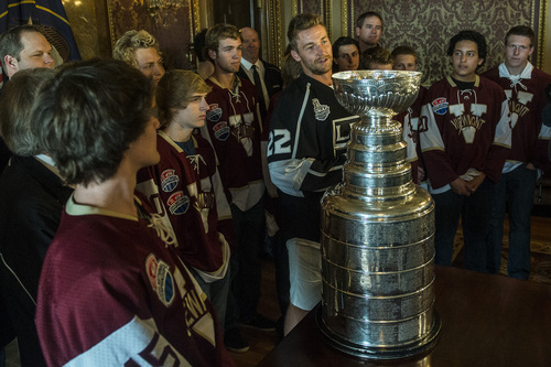 Chris Detrick  |  The Salt Lake Tribune
Los Angeles Kings' Trevor Lewis talks with the Viewmont state championship hockey team and the Stanley Cup at the Utah State Capitol Wednesday August 27, 2014. Lewis is a Salt Lake City native who played for Brighton's club team as a freshman in 2002. Hockey tradition dictates that each member of the winning team gets custody of the Cup for one day.