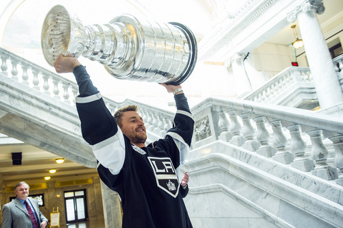Chris Detrick  |  The Salt Lake Tribune
Los Angeles Kingsí Trevor Lewis shows off the Stanley Cup to fans at the Utah State Capitol Wednesday August 27, 2014. Lewis is a Salt Lake City native who played for Brightonís club team as a freshman in 2002. Hockey tradition dictates that each member of the winning team gets custody of the Cup for one day.