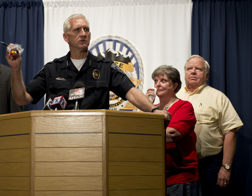 Lennie Mahler  |  The Salt Lake Tribune
Salt Lake County Sheriff Jim Winder speaks to the press as siblings Shirley England and Jerold Johnson, right, listen. Unified police believe they solved the 1991 cold-case murder of their mother, Lucille Johnson. Winder holds a bag of Legos like the ones found at the crime scene. Thursday, Aug. 28, 2014.
