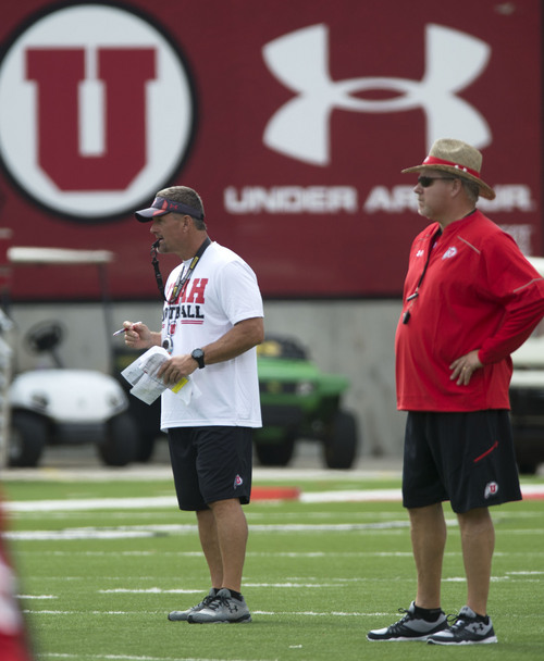 Steve Griffin  |  The Salt Lake Tribune

Utah head football coach Kyle Whittingham, left, and offensive coordinator Dave Christensen watch the offense during football practice at Rice-Eccles Stadium in Salt Lake City Monday, Aug. 4, 2014.