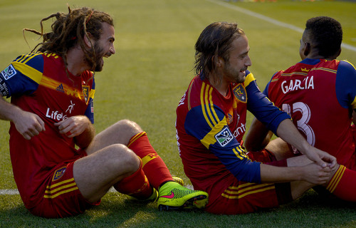 Leah Hogsten  |  The Salt Lake Tribune
Real Salt Lake midfielder Kyle Beckerman (5) joins the row boat with Real Salt Lake midfielder Ned Grabavoy and Real Salt Lake forward Olmes Garcia (13) after Real Salt Lake forward Joao Plata's (8) goal during the first half of their matchup as Real Salt Lake leads D. C. United 3-0 Saturday, August 9, 2014, at Rio Tinto Stadium.