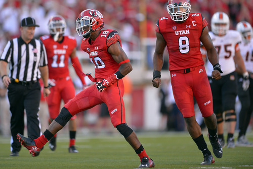 Chris Detrick  |  The Salt Lake Tribune
Utah Utes defensive back Eric Rowe (18) celebrates a tackle during the first half of the game at Rice-Eccles stadium Thursday August 28, 2014. Utah is winning the game 35-7.
