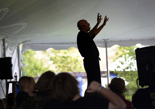 Scott Sommerdorf   |  The Salt Lake Tribune
Antonio Rocha tells a story about nearly drowning while performing at under the Bonneville tent at the annual Timpanogos Storytelling Festival, which  finished up its three-day run on Saturday at Timpanogos Park on Saturday.