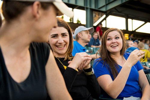 Trent Nelson  |  The Salt Lake Tribune
Betsy Tracy, right, attending a Salt Lake Bees baseball game with friends Celeste Rosenlof, center, and Faith Jolley, in Salt Lake City. Tracy is a 23-year-old broadcast journalist who grew up in Missouri. She walks to her job at the Triad Center and loves downtown city life.