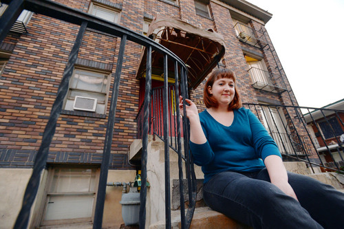 Steve Griffin  |  The Salt Lake Tribune
Caitie Giauque, 28, outside her apartment complex near Trolley Square mall in Salt Lake City. The artistically inclined Provo native says the downtown "is a manageable size. ... I like where I am."