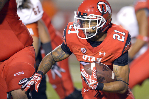 Chris Detrick  |  The Salt Lake Tribune
Utah Utes running back Troy McCormick (21) runs the ball during the second half of the game at Rice-Eccles stadium Thursday August 28, 2014. Utah defeated Idaho State 56-14.