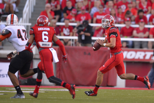 Chris Detrick  |  The Salt Lake Tribune
Utah Utes quarterback Travis Wilson (7) looks to pass the ball during the first half of the game at Rice-Eccles stadium Thursday August 28, 2014. Utah is winning the game 35-7.