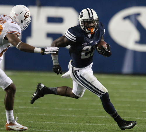 Rick Egan  |  The Salt Lake Tribune
BYU running back Jamaal Williams rushes the ball against Texas, Saturday, Sept. 7, 2013. The Cougars broke all-time rushing offense records.