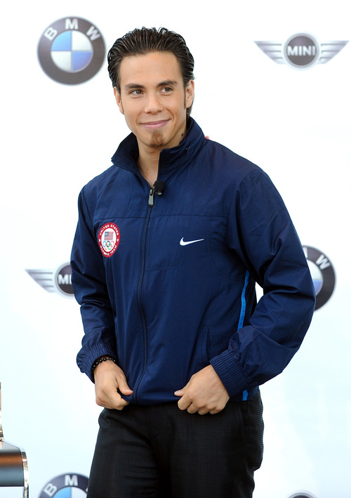 U.S. Olympic speedskater Apolo Anton Ohno is shown at a news conference announcing a multi-year partnership between BMW Group and the United States Olympic Committee at BMW of Manhattan on Monday, July 26, 2010 in New York. (AP Photo/Evan Agostini)