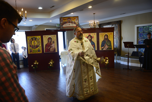 Scott Sommerdorf   |  The Salt Lake Tribune
Father Jimi Foreso from St. Catherine Greek Orthodox Church of Greenwood Village, Colorado, led the inaugural worship service of the Greek Orthodox community's new Mission Parish atThe  Woods on Ninth, Sunday, August 31, 2014.