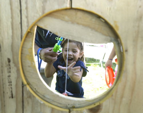 Rick Egan  |  The Salt Lake Tribune

Javlynn Jimenez, 4, West Valley, smiles as she reels in her prize from the fishbone at the Magna Labor Day Picnic, Monday, September 1, 2014.