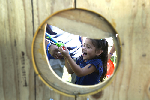 Rick Egan  |  The Salt Lake Tribune

Javlynn Jimenez, 4, West Valley, smiles as she reels in her prize from the fishbone, at the Magna Labor Day Picnic, Monday, September 1, 2014