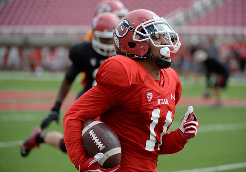 Francisco Kjolseth  |  The Salt Lake Tribune
Wide receiver Kaelin Clay of the University of Utah football team leaves the defense behind during practice at Rice-Eccles Stadium on Tuesday morning, Aug. 12, 2014.