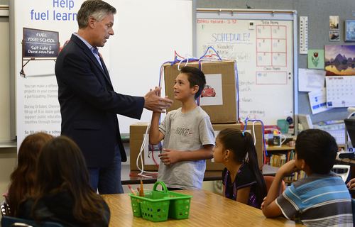 Scott Sommerdorf   |  The Salt Lake Tribune
Fourth grader Markay Herrera slaps hands with Jon Huntsman Jr. as Huntsman helped deliver teaching materials to Melody Francis' 4th grade classroom at Rose Park Elementary in association with Chevron's 2014 Fuel Your School Program, Wednesday Sept. 3, 2014. Huntsman has been a U.S. Ambassador to China and Utah's Governor and is currently a Chevron Board of Directors Member.