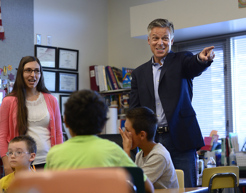 Scott Sommerdorf   |  The Salt Lake Tribune
Jon Huntsman, Jr. jokes with students as he helped deliver teaching materials to Melody Francis' 4th grade classroom at Rose Park Elementary in association with Chevron's 2014 Fuel Your School Program, Wednesday Sept. 3, 2014. Huntsman has been a U.S. Ambassador to China and Utah's Governor and is currently a Chevron Board of Directors Member. Teacher Melody Francis is at far left.