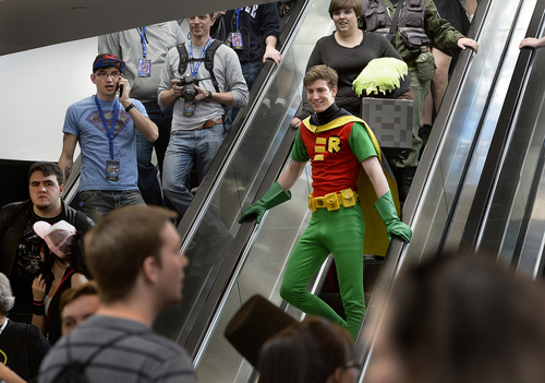 Scott Sommerdorf   |  Tribune file photo
A man in a "Robin" suit arrives at the opening day of Salt Lake Comic Con, Thursday, April 17, 2014.