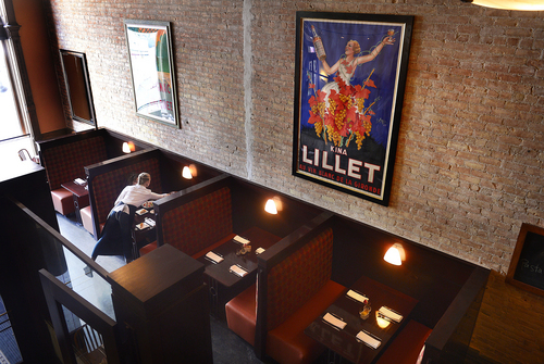 Scott Sommerdorf   |  The Salt Lake Tribune
Looking down upon the renovated front room and booths and newly revealed brick walls at  Martine restaurant, Friday, Aug. 29, 2014. The Salt Lake City restaurant is dealing with the construction of the new Main Street theater next door. Rather than endure all the noise and pounding, they closed for six weeks this summer for a remodel of their own.