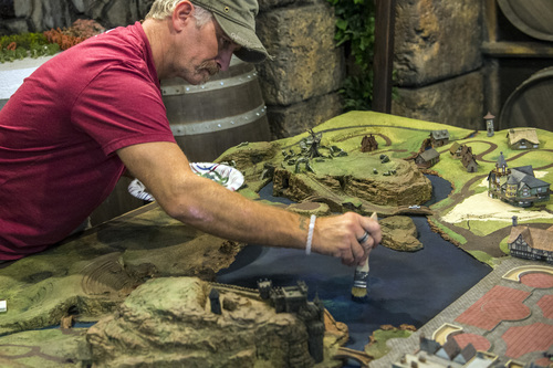 Chris Detrick  |  The Salt Lake Tribune
Jeff MacKay works at painting a working scale model of Evermore Adventure Park at their warehouse in Lindon Wednesday August 27, 2014.