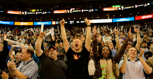 Trent Nelson  |  The Salt Lake Tribune
Jazz fans celebrate as the Utah Jazz defeat the New Orleans Pelicans, NBA basketball at EnergySolutions Arena in Salt Lake City, Wednesday November 13, 2013.
