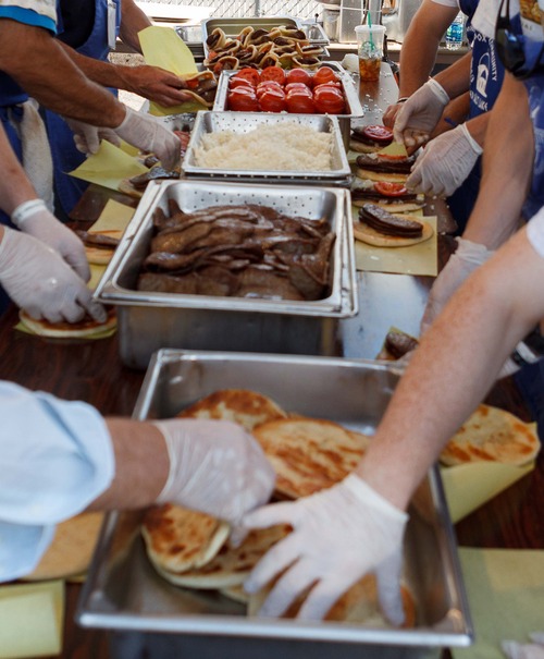 Trent Nelson  |  Tribune file photo
Gyros are made at the 2012 Salt Lake Greek Festival in Salt Lake City. This year's festival at Holy Trinity Cathedral runs daily through Sunday.