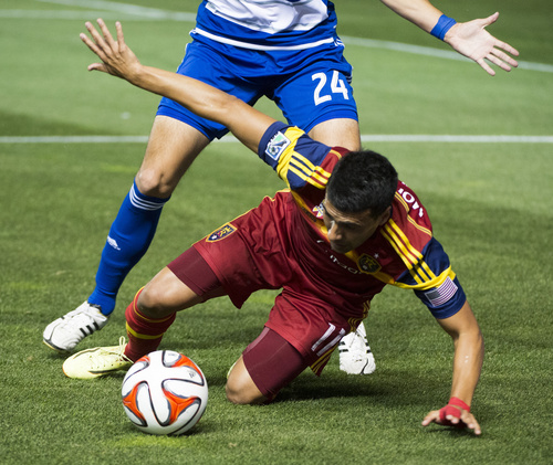 Rick Egan  |  The Salt Lake Tribune

Real Salt Lake midfielder Javier Morales (11) tries to keep control of the ball, as he is bumped by FC Dallas defender Matt Hedges (24), in MLS action, Real Salt Lake vs. FC Dallas , at Rio Tinto Stadium, Thursday, September 6, 2014